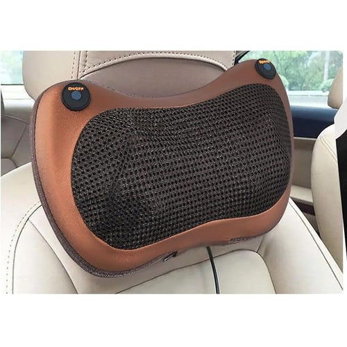 Aliviador muscular Punto Calma instalado en el asiento del auto como cojín de masaje